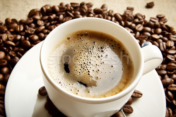 Macro coffee with foam at breakfast on fabric linen Stock photo © dla4