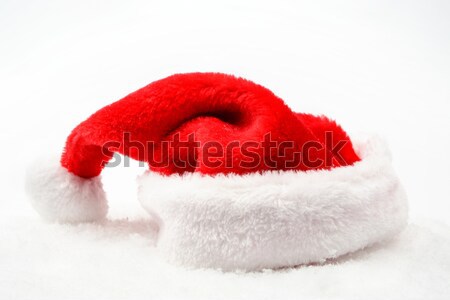 Stock photo: Santa claus christmas red cap with white collar on snow