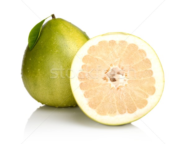 Two pomelos,half with drops water and leaf isolated on white Stock photo © dla4