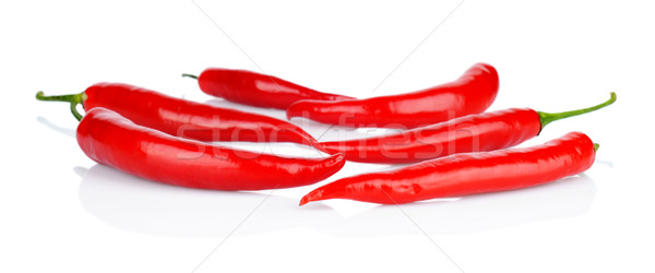 Perspective view of red peppers isolated white background Stock photo © dla4