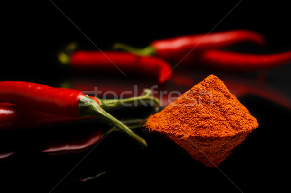 Studio shot chilli pepper, cayenne pepper isolated on black Stock photo © dla4