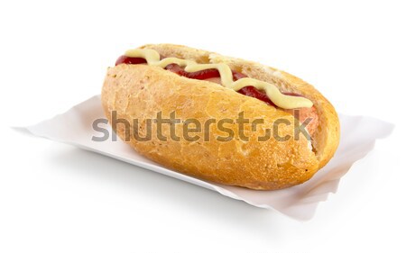 Stock photo: Hot dog with mustard and ketchup in the tray isolated on white