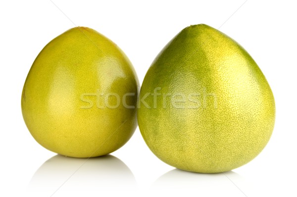 Two pomelos chinese grapefruits isolated on white Stock photo © dla4