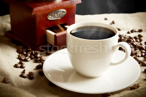 Long shot of cup of coffee,bag,coffee beans on flax linen Stock photo © dla4