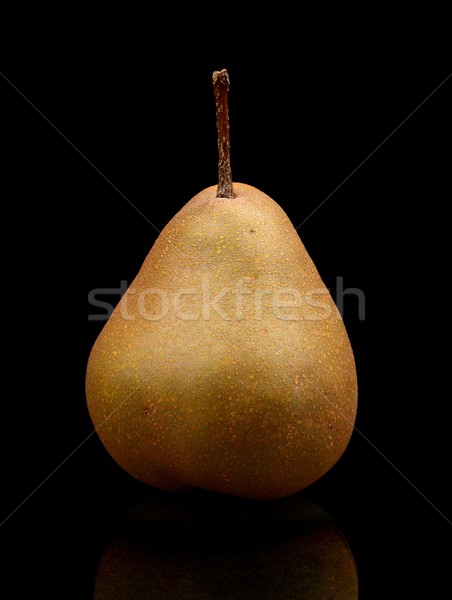 Single one pear called manon isolated on black Stock photo © dla4