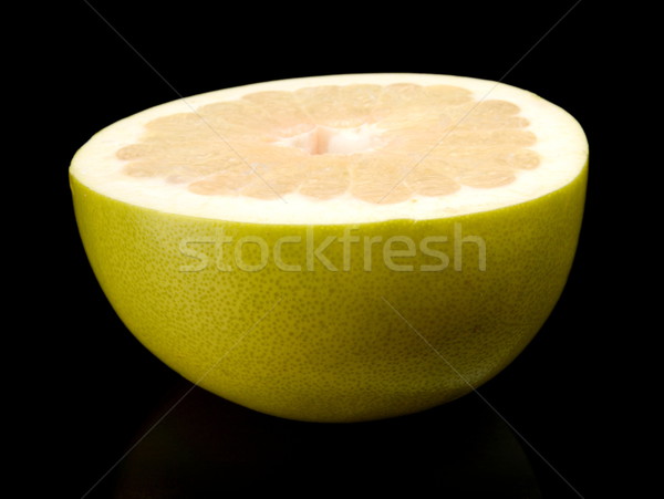 Half of pomelo, chinese grapefruit isolated on black Stock photo © dla4