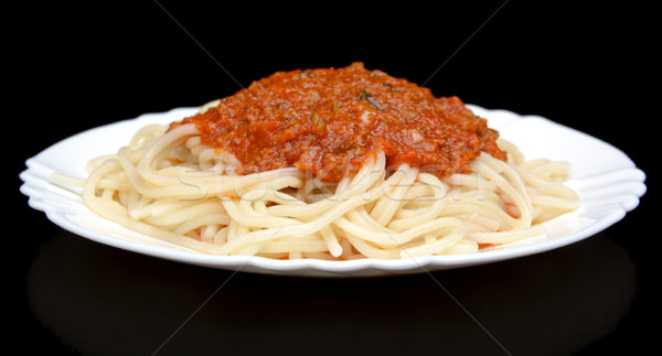 Stock photo: Pasta spaghetti bolognese sauce on black isolated