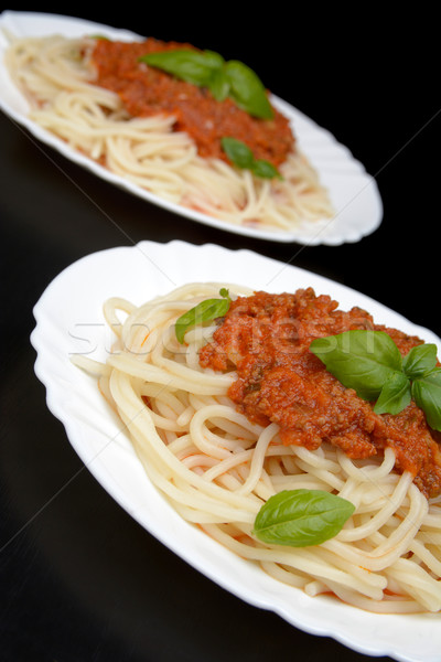 Close up pasta ragu alla bolognese sauce on black Stock photo © dla4