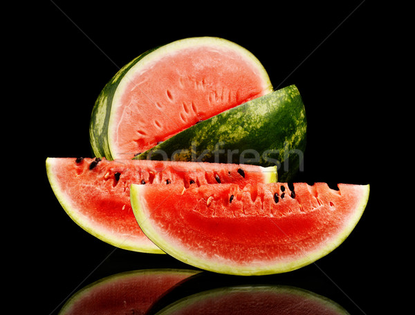 Studio shot whole and slice of watermelon isolated black Stock photo © dla4