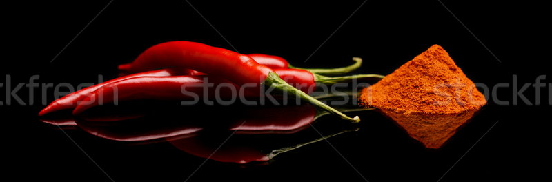 Studio shot chilli pepper, cayenne pepper isolated on black Stock photo © dla4