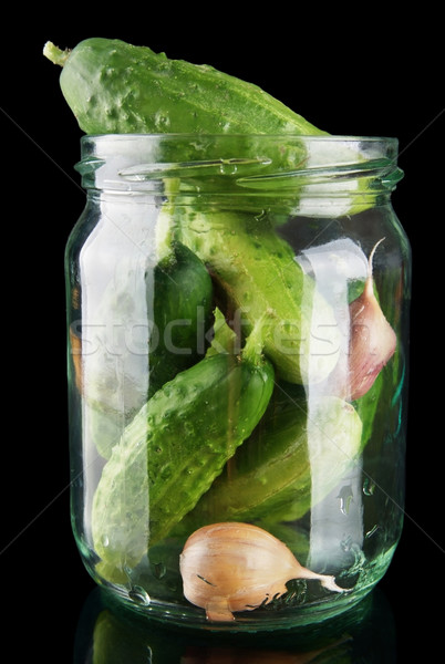 Komkommers jar zwarte geïsoleerd voedsel ruimte Stockfoto © dla4