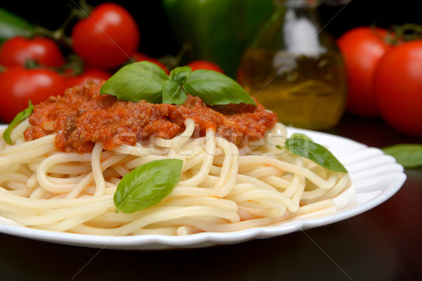 Spaghetti bolognese on black Stock photo © dla4