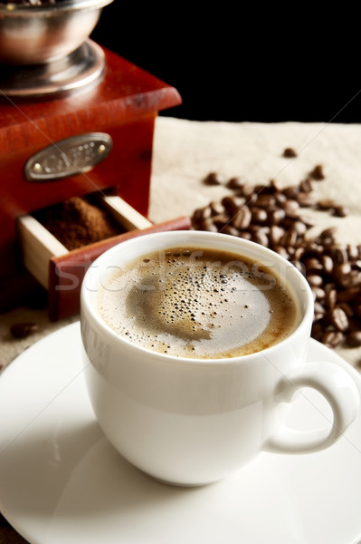 Panoramic view of frothy coffee cup with beans on fabric flax Stock photo © dla4