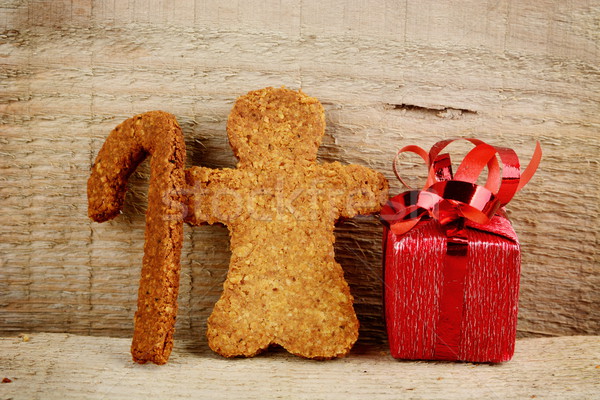 Christmas gingerbread santa claus on wooden structure Stock photo © dla4