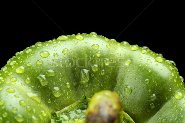 Macro cut shot of green bell pepper background with water drops Stock photo © dla4