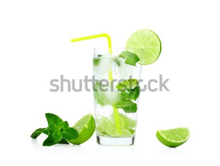 Mojito drink in dewy glass,cold water,ice cubes,mint,straw and l Stock photo © dla4