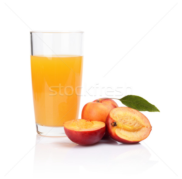 Close-up shot sliced nectarines with juice and leaf Stock photo © dla4