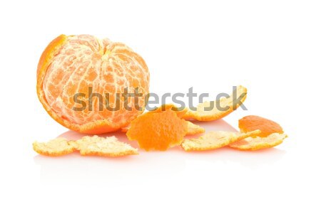 Single peeled mandarine with rind isolated on white Stock photo © dla4