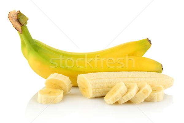 Bunch of bananas with slices on white background  Stock photo © dla4