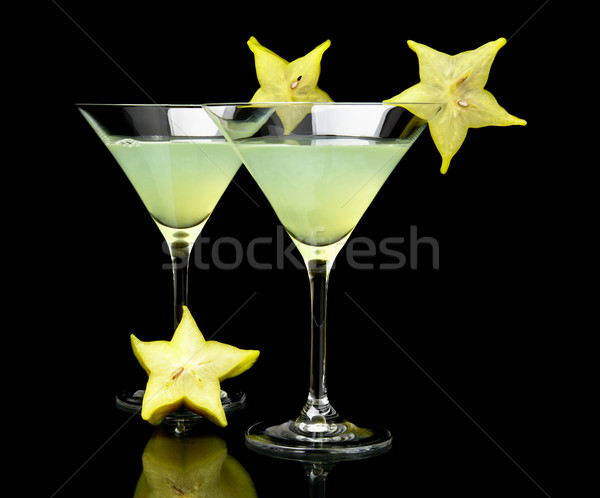 Cropped view of cosmo margarita drinks on black Stock photo © dla4