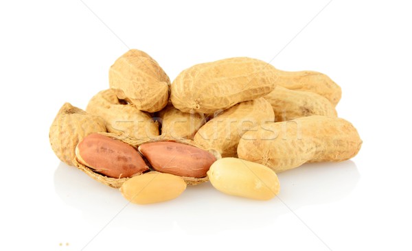 Peanuts nuts on white background Stock photo © dla4