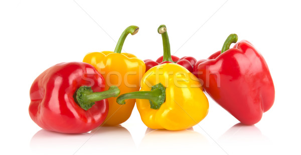 Studio shot of red and yellow bell peppers isolated on white Stock photo © dla4