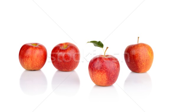 Apple which stands out from the crowd isolated Stock photo © dla4