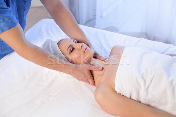 girl masseur doing massage in spa health Stock photo © dmitriisimakov