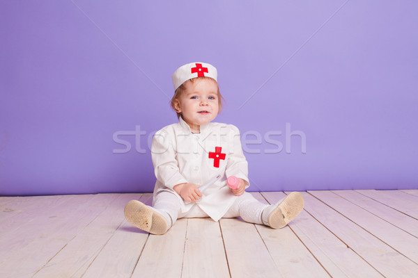 little girl dressed as a doctor plays in hospital Stock photo © dmitriisimakov