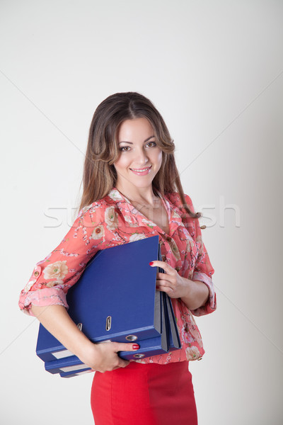 Stock photo: the business Secretary in an Office with folders securities documents