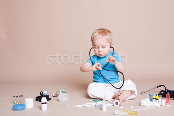 Boy playing in the doctor in the hospital Stock photo © dmitriisimakov