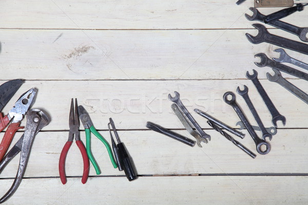 construction hammers screwdriver repair tool pliers on the boards Stock photo © dmitriisimakov