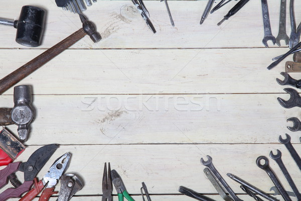 construction hammers screwdriver repair tool pliers on the boards Stock photo © dmitriisimakov