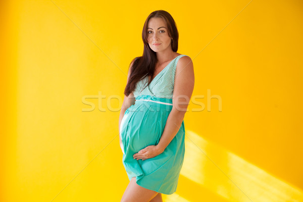 Terhes nő szülés citromsárga lány baba boldog Stock fotó © dmitriisimakov
