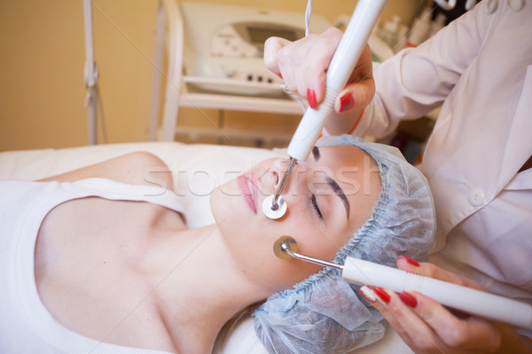 Cosmetology Spa woman doing procedures on the face Stock photo © dmitriisimakov