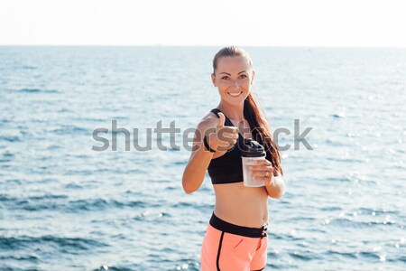 beautiful girl in a bathing suit sunning on the beach Stock photo © dmitriisimakov