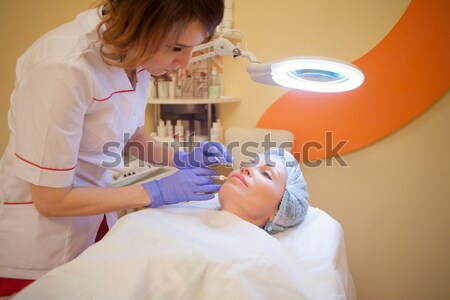 Orvos ajak beteg injekció injekciós tű fürdő Stock fotó © dmitriisimakov