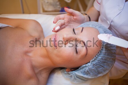Cosmetology Spa woman doing facial massage Stock photo © dmitriisimakov