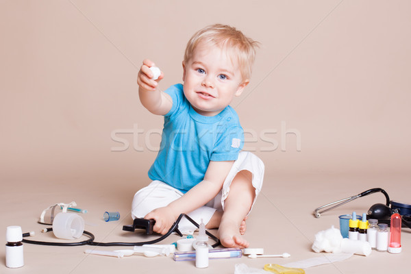 Boy playing in the doctor in the hospital Stock photo © dmitriisimakov