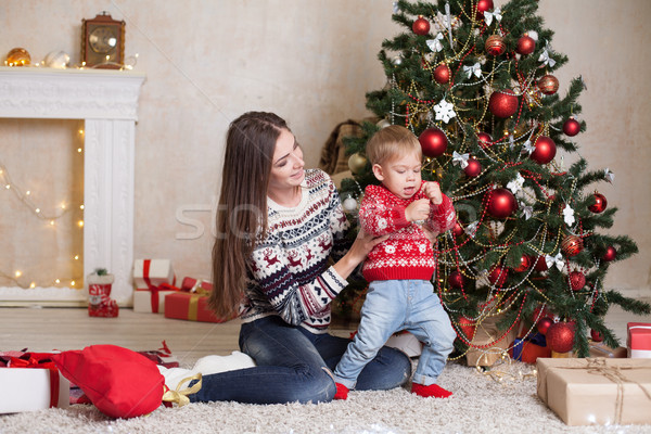 mom with son decorate tree on new year's Gifts Christmas Stock photo © dmitriisimakov