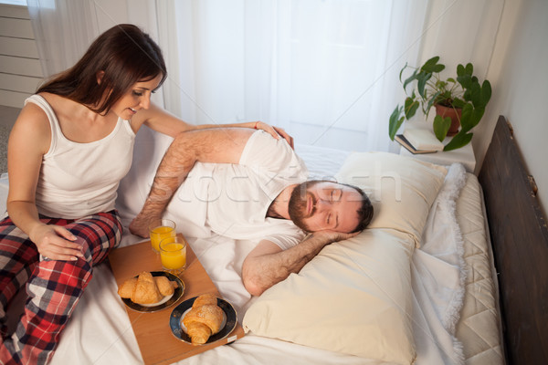 husband and wife woke up in the morning, breakfast in bed Stock photo © dmitriisimakov