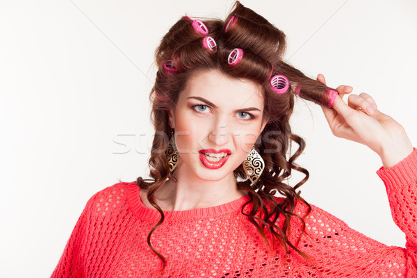 girl with curling irons makes hair style Stock photo © dmitriisimakov