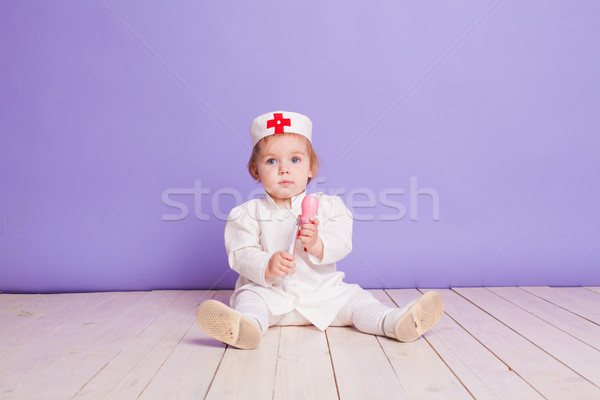 little girl dressed as a doctor plays in hospital Stock photo © dmitriisimakov