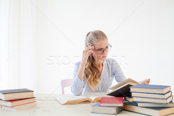 the teacher reads a book in the library business woman Stock photo © dmitriisimakov