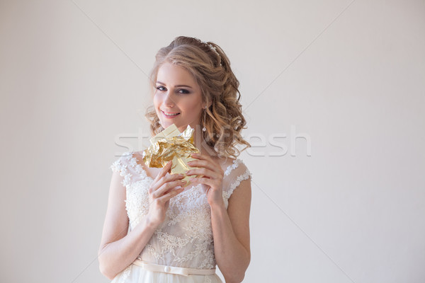 the bride at a wedding in room eating white chocolate Stock photo © dmitriisimakov