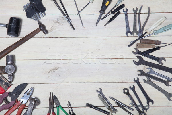 construction hammers screwdriver repair tool pliers on the boards Stock photo © dmitriisimakov