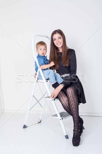 mother and young son on the stairs stepladder Stock photo © dmitriisimakov