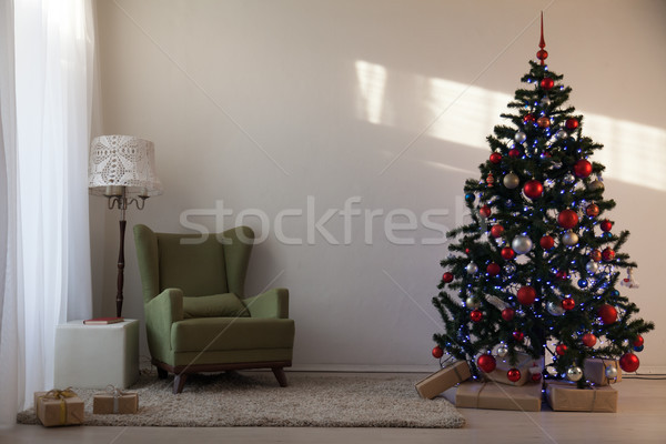 Christmas tree in a white room on new year's Eve Stock photo © dmitriisimakov