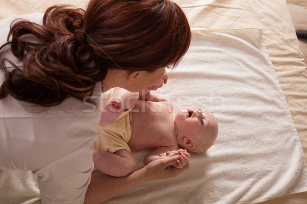 the little boy baby mother doing massage hands and legs Stock photo © dmitriisimakov