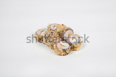 Stock photo: Japanese food Sushi rolls with fish on a white background